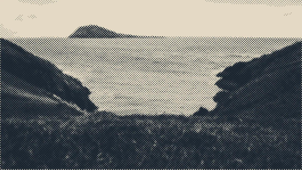 The Welsh coast under grey weather.