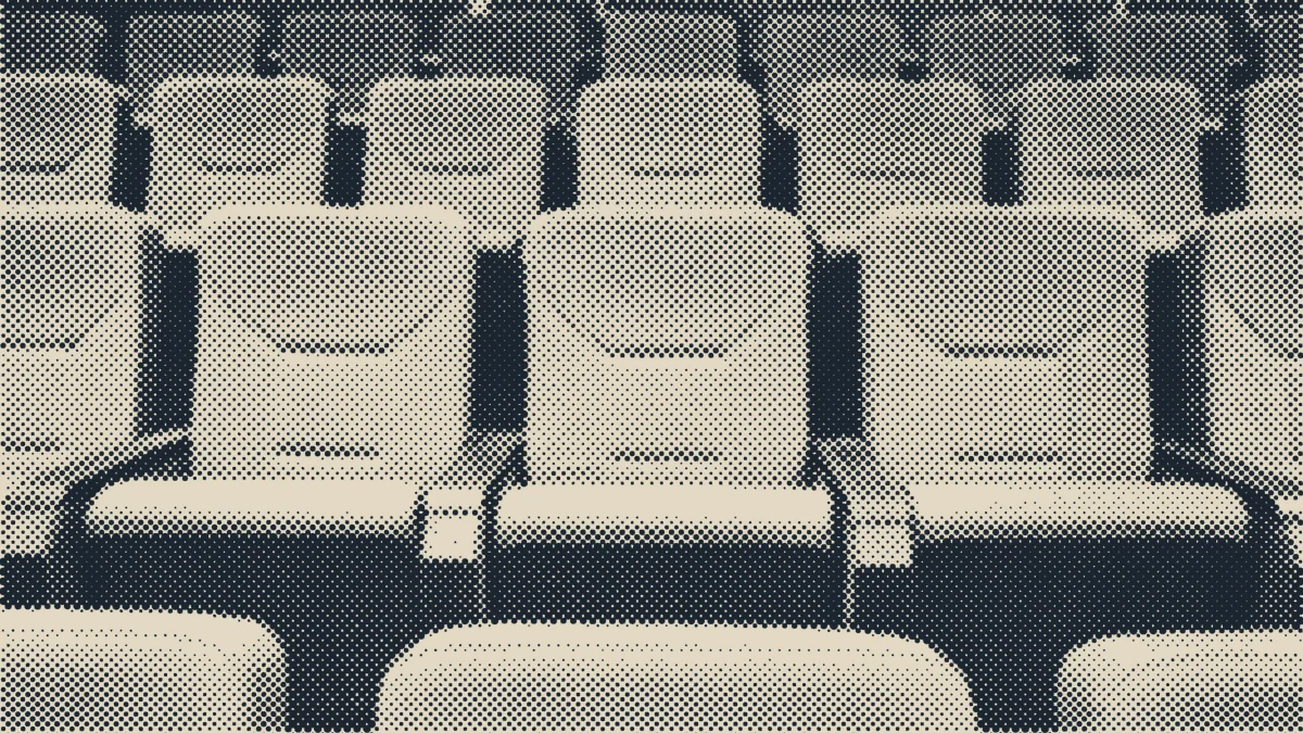 An empty concert hall seen from the stage.