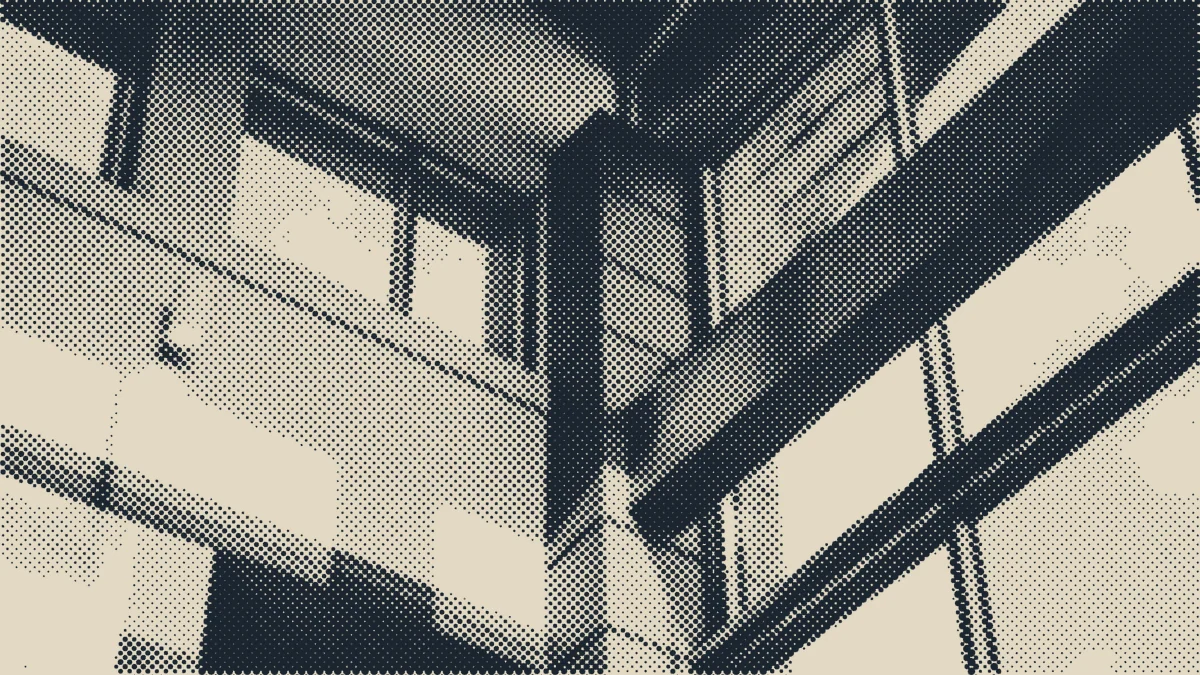 A theatre lobby behind glass.